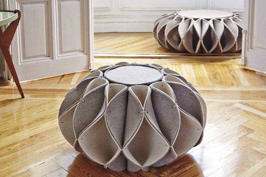 The Ruff High Pouf in a beige gray